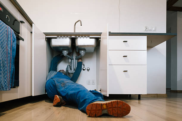 Professional Drain Cleaning technician working in Ogilvie, MN